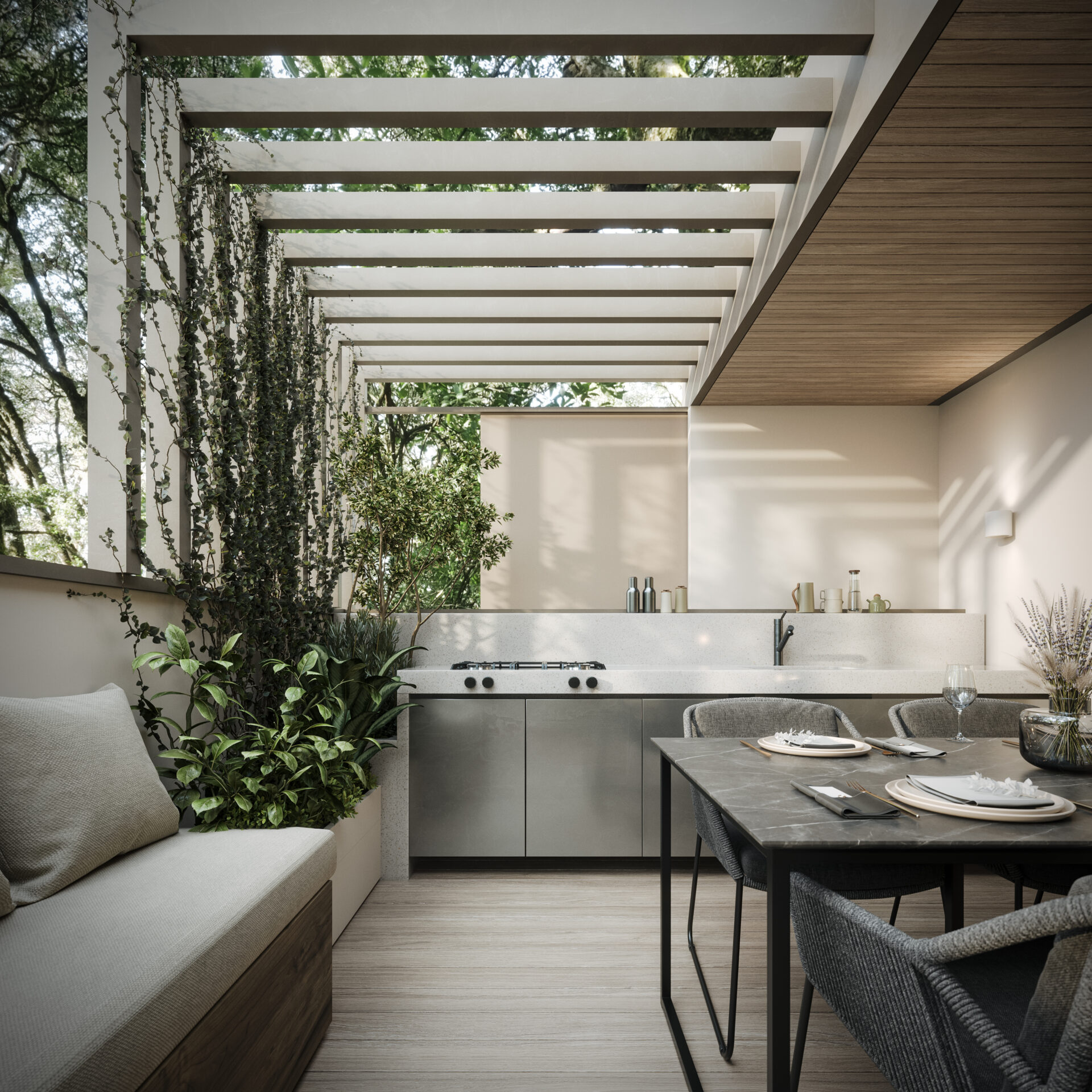 Modern outdoor kitchen with sleek design, featuring wood and greenery. Includes a dining table set and overhead pergola providing shade. Tranquil, inviting atmosphere.